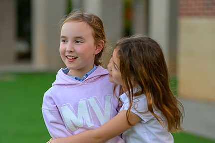 Two girls smiling. Links to Gifts of Life Insurance Two girls smiling. Links to Gifts of Life Insurance
