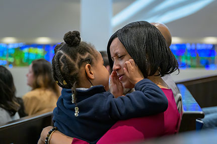 A mother holding her daughter. Links to Closely Held Business Stock A mother holding her daughter. Links to Closely Held Business Stock